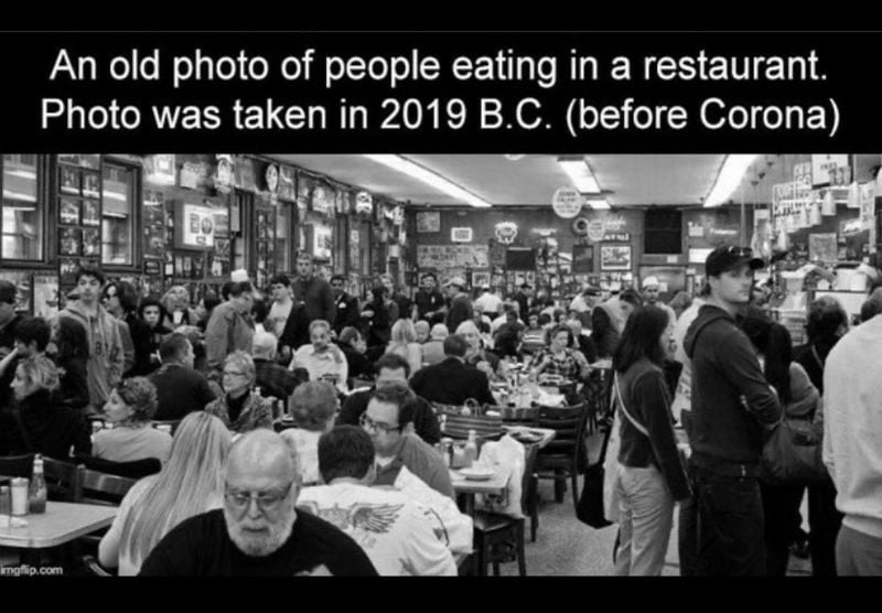a photo of people eating in a restaurant 