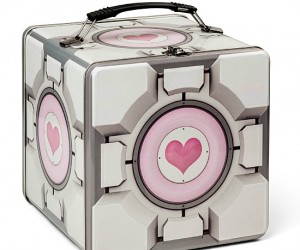Protect your lunch with love in this durable and adorable, uh, adurable… Companion Cube tin lunch box.