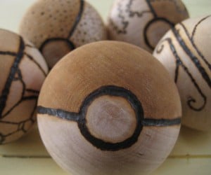 Custom Wood Burned Pokeballs – Just make sure you don’t hold any fire types inside