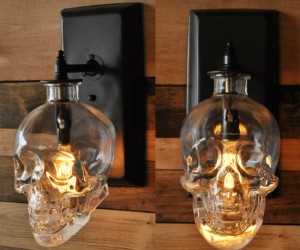 Made from a recycled Crystal Head Vodka bottle, this wall sconce is bound to give your house guests a fright!