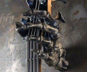 Grim Reaper Skeleton Hand Guitar Holder also known as the “Grip Reaper” without actually ripping your beloved guitar.