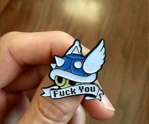 Mario Kart Blue Shell Pin – Whether you’ve been on the receiving end or the sender of a blue shell in Nintendo’s Mario Kart video game, the phrase on this enamel