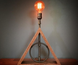 Harry Potter Deathly Hallows Lamp – Deathly Hallows meets modern industrial style in this lamp. Unique. Classy. Subtle. Might be the best HP related gift out there.