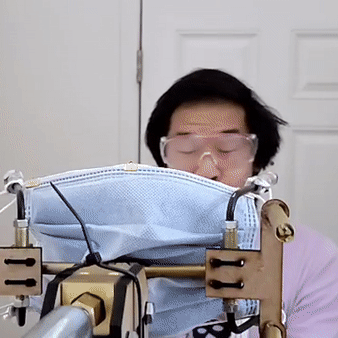 Face Mask Gun – Guy creates gun that shoots face masks onto people’s faces!