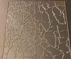 Broken Glass Puzzle – Totally clear acrylic laser cut jigsaw puzzle, the finished design looks like a shattered glass window!